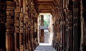 . Qutb Minar and Alai Darwaza (Alai Gate), the entrance to the Quwwat-Ul-Islam Mosque.